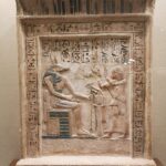 Anubis receiving offerings, hieroglyph name
